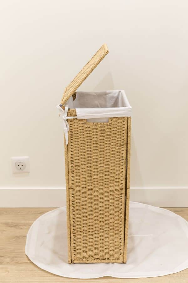How To Care For Your Organic Cotton Duvet 2 Empty wicker basket in a the laundry room to demonstrate one of the steps of How To Care For Your Organic Cotton Duvet