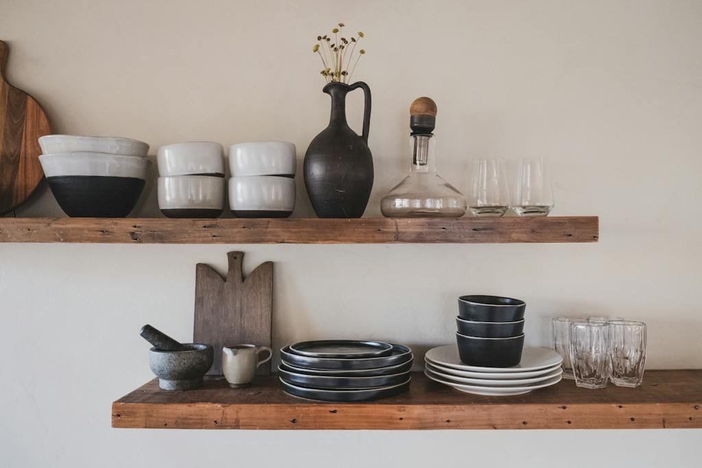 Ceramic dinnerware on Brown Wooden Shelves