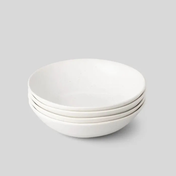 Stack of white Fable pasta bowls, perfect for any meal
