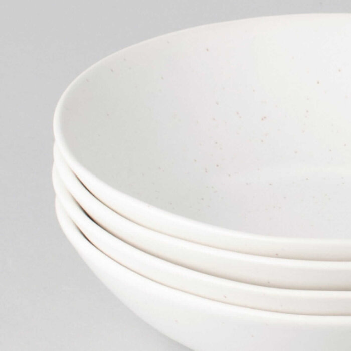 lead free pasta bowls lose-up of speckled white pasta bowls, showcasing the unique finish of Fable pasta bowls.