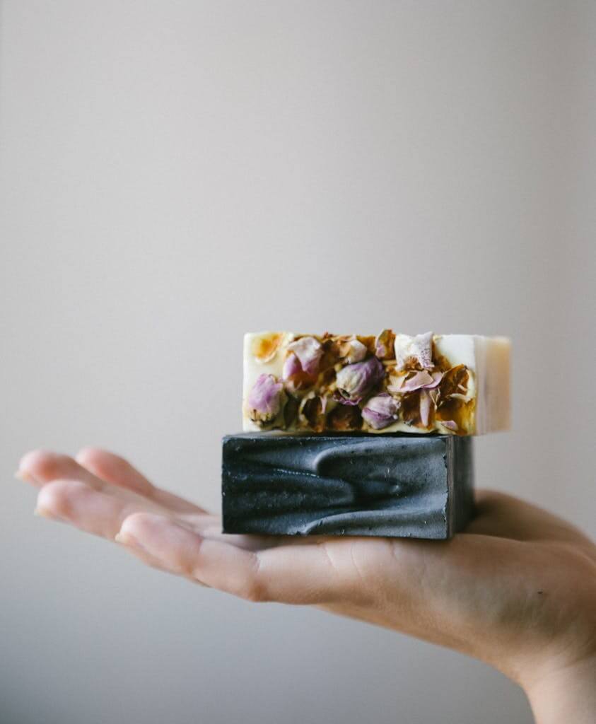Person Holding Handmade Soaps