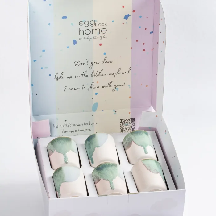 Douro Cup A set of six Douro Cups by Egg Back Home in their packaging box, which includes a message about the high quality and care of the stoneware.