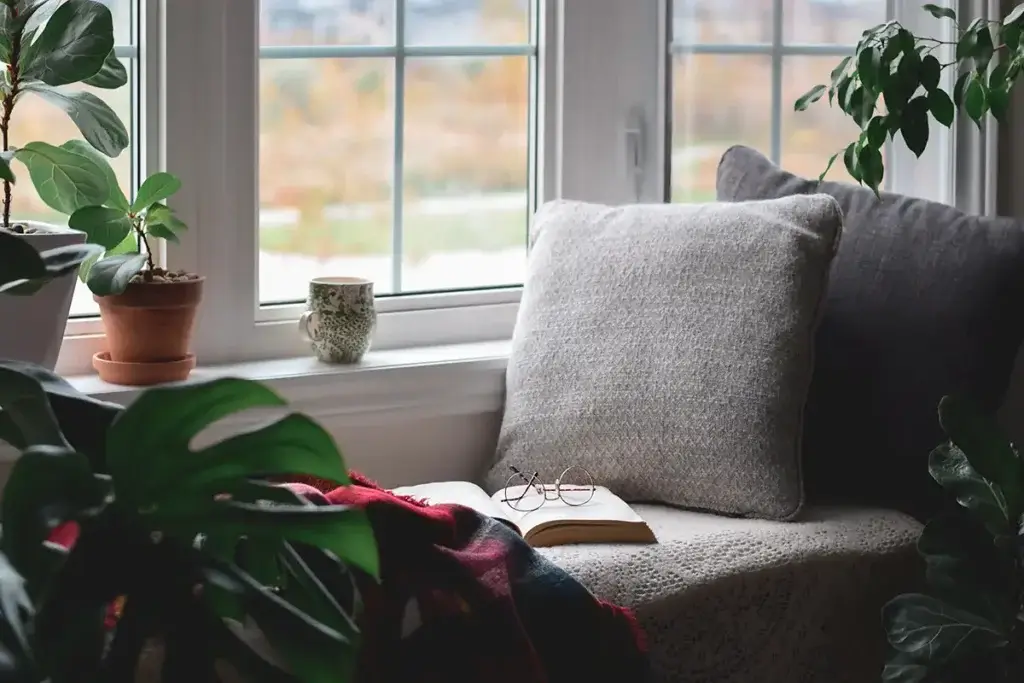 17 Easy Bedroom Refresh Ideas for a Welcoming Space 6 Bedroom Refresh Ideas: Create a cozy reading nook with a comfortable chair, a side table, and a lamp for a relaxing escape.