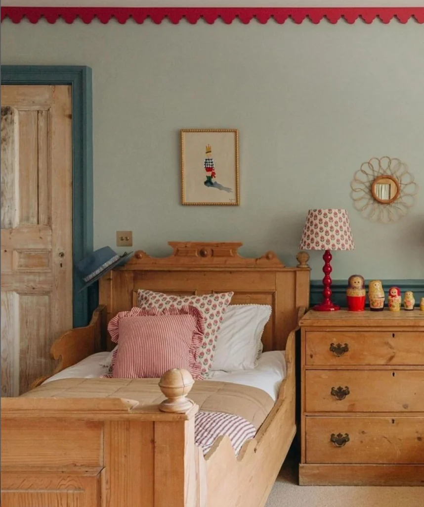 35 Nightstand Decor Ideas For a Spicy Makeover 20 creative nightstand decor idea. Red accent bedroom, red accent vintage lamp and Russian nested dolls