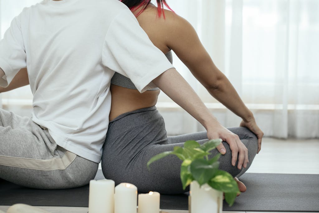 Tantric Breathing: A Comprehensive Guide to Enhanced Intimacy and Well-being (2024) 2 Crop woman and man stretching body doing yoga and tantric breathing