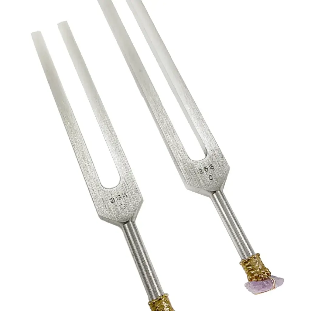 C & G Tuning Forks for Sound Healing with Brass Caps and Amethyst 4 Close-up view of the finely crafted brass caps and amethyst crystals on the C & G Tuning Forks.