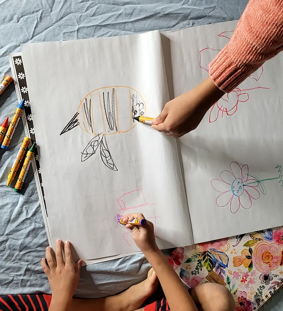 Eco Kids Beeswax Non-Toxic Crayons - Extra Large Case 2 My Children using Eco Kids Beeswax Non-Toxic Crayons to create vibrant artwork.