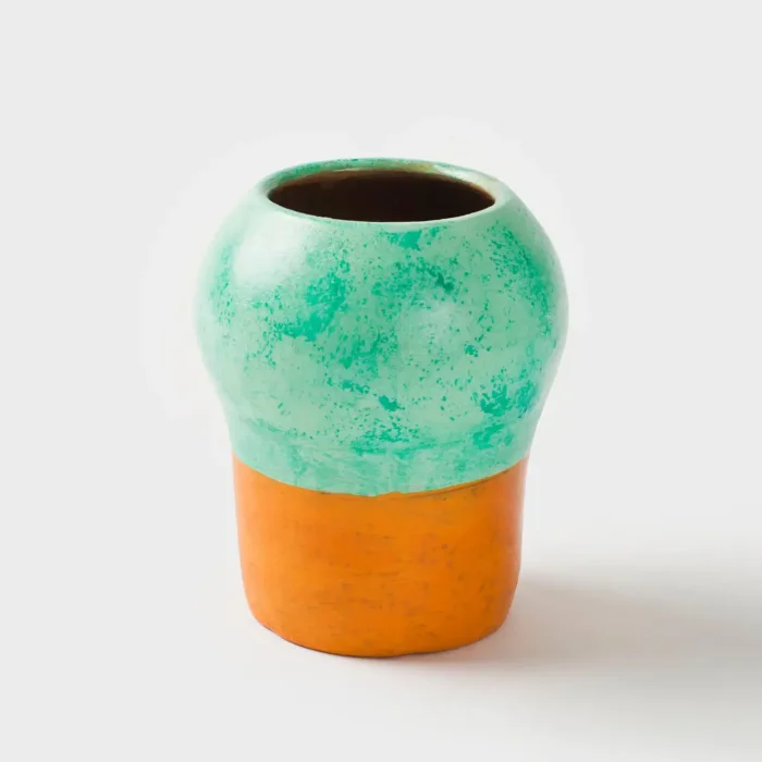 ceramic toothbrush holder on white background