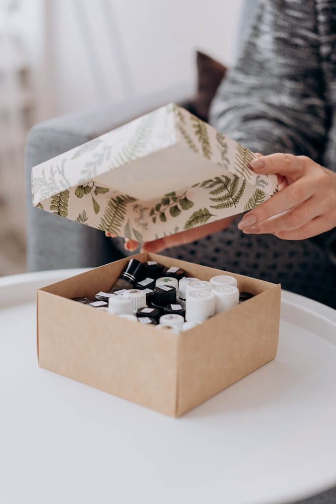 Natural vs. Synthetic Fragrances: A Quick Guide 3 Box Of Essential OIls On Table. Natural vs. Synthetic Fragrances