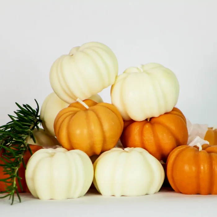 fall decorative candles a stack of fall decorative candles on white background
