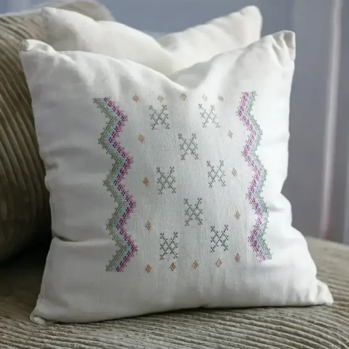 hand embroidered cotton pillows on sofa