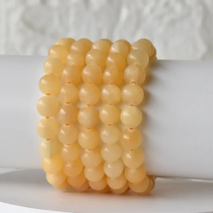 closeup up on 6 natural bead bracelet