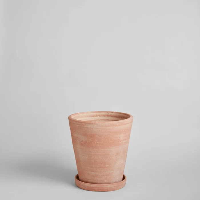 white washed terra cotta pot on white background