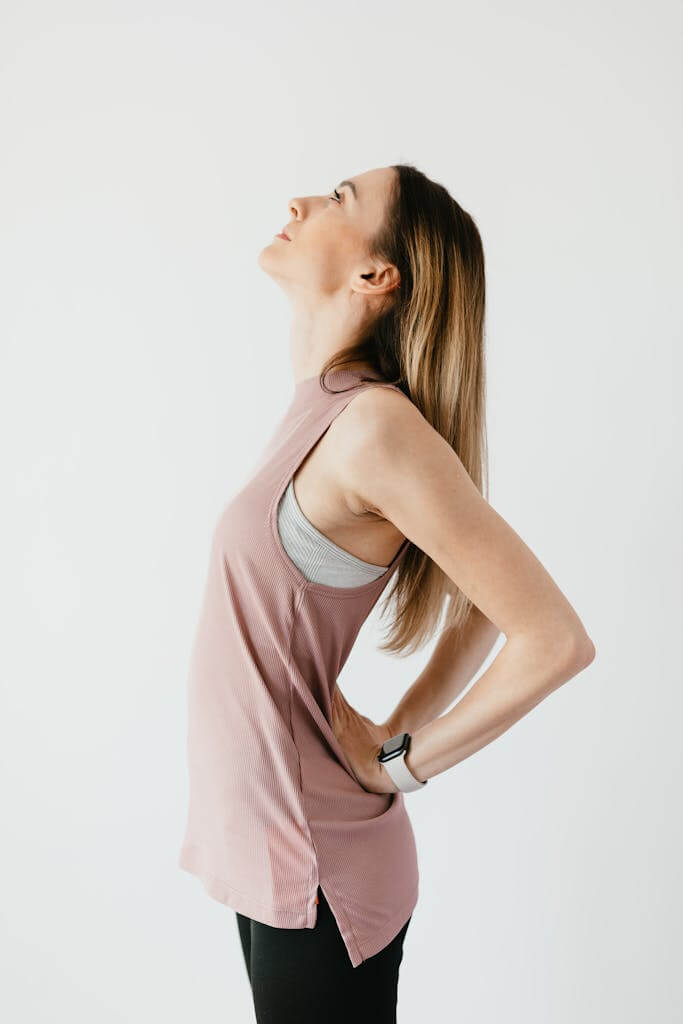 Yoga with Crystals: Amplify Your Practice Today! 5 young woman doing back bend yoga pose while standing