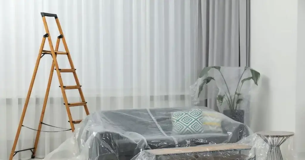 Cleaning Popcorn Ceilings: Ultimate 2024 Guide with Proven Tips from Years of Experience 3 cover the floor and furniture with plastic sheets . Clean Popcorn Ceilings