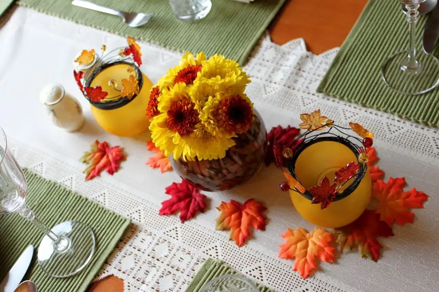 9 Effortless Budget-Friendly Ways to Switch Your Decor From Summer to Fall in 2024 5 orange yellow fall centerpiece