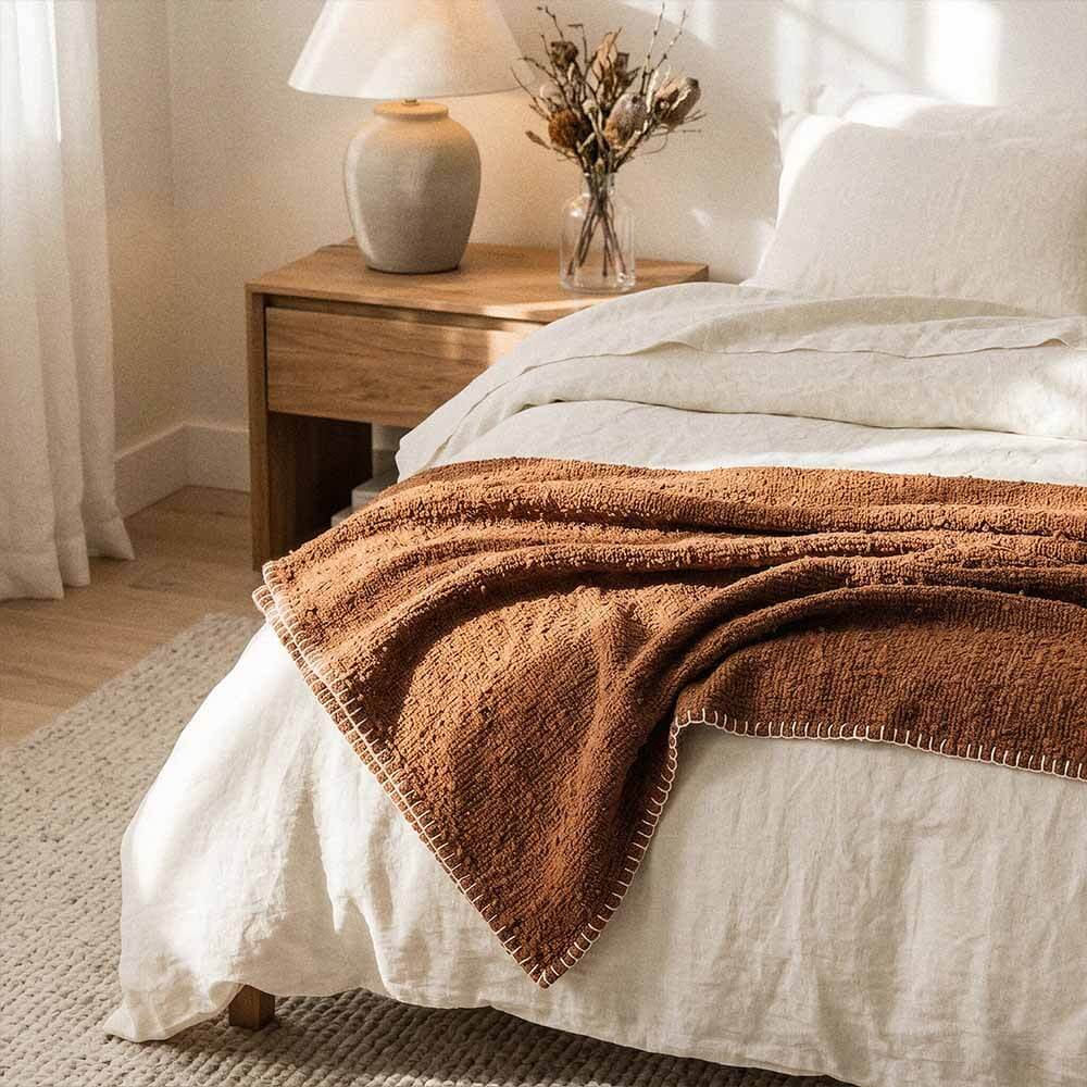 Boucle Throw Blanket | Boho Cotton Boucle Throw Blanket 5 Cotton boucle throw blanket in rust with textured woven fabric